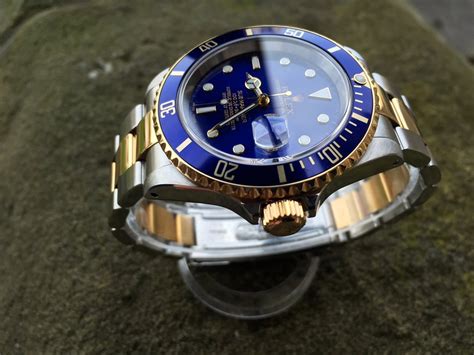 rolex submariner blue gold steel.